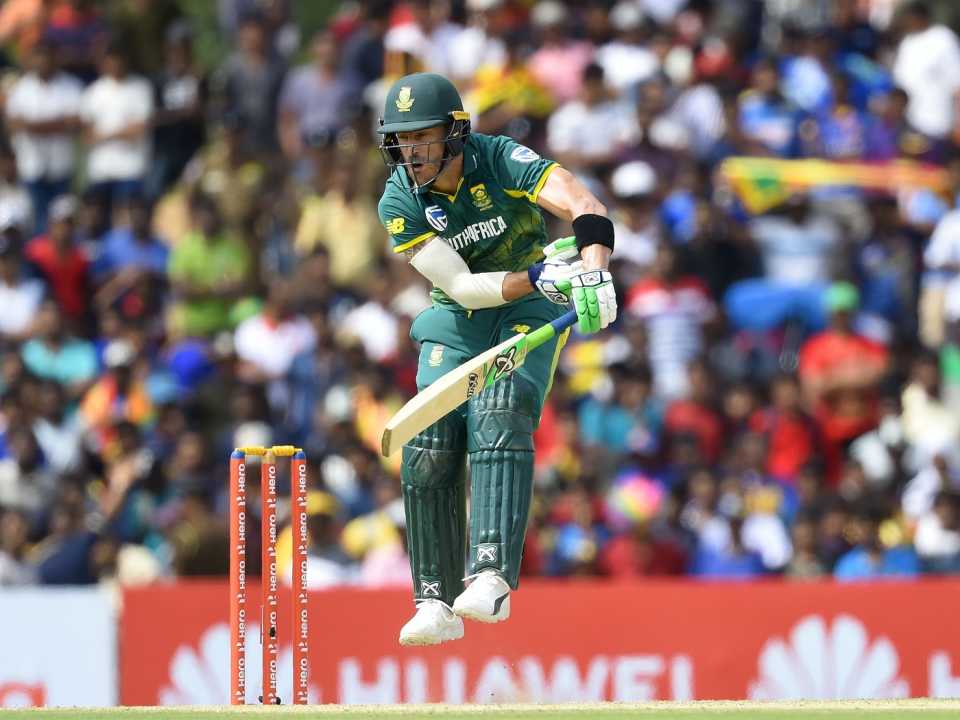 Faf du Plessis jumps to deal with the bounce