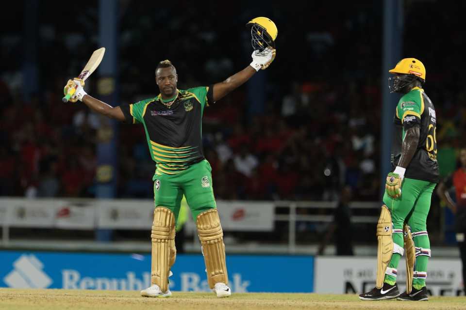 Andre Russell celebrates his hundred