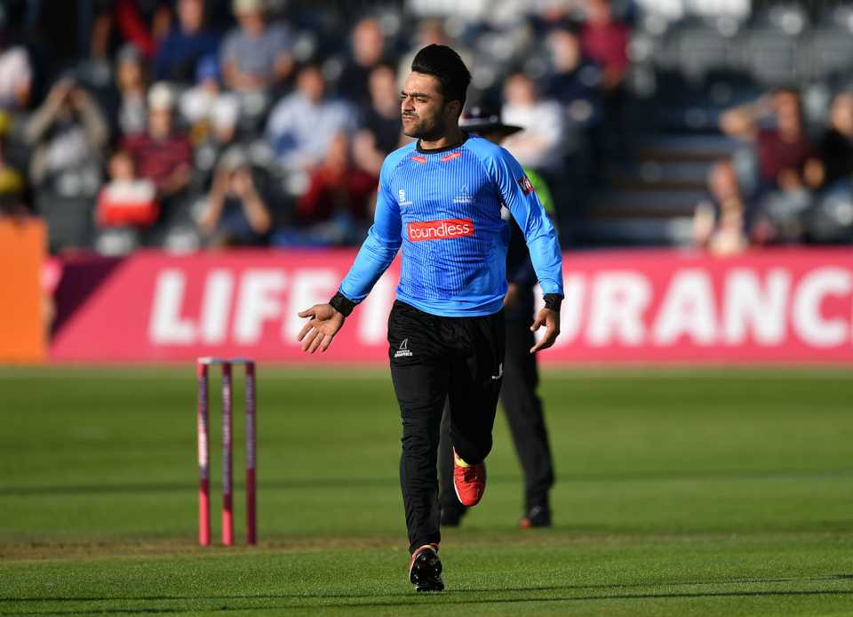 Rashid Khan celebrates a wicket in low-key fashion