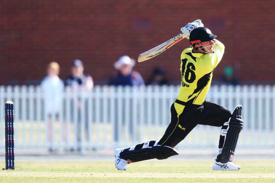 Marcus Stoinis goes for a big drive