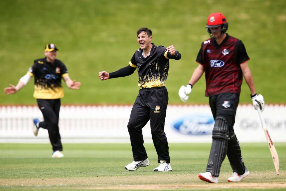 Hamish Bennett celebrates a wicket