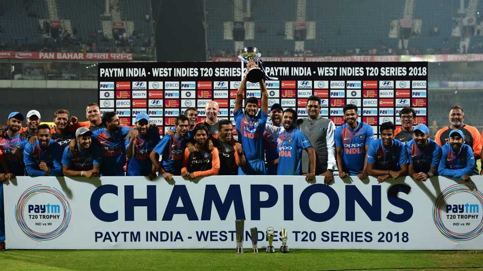 India players pose with the trophy