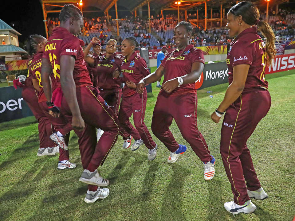 The West Indies players celebrate their win with a dance
