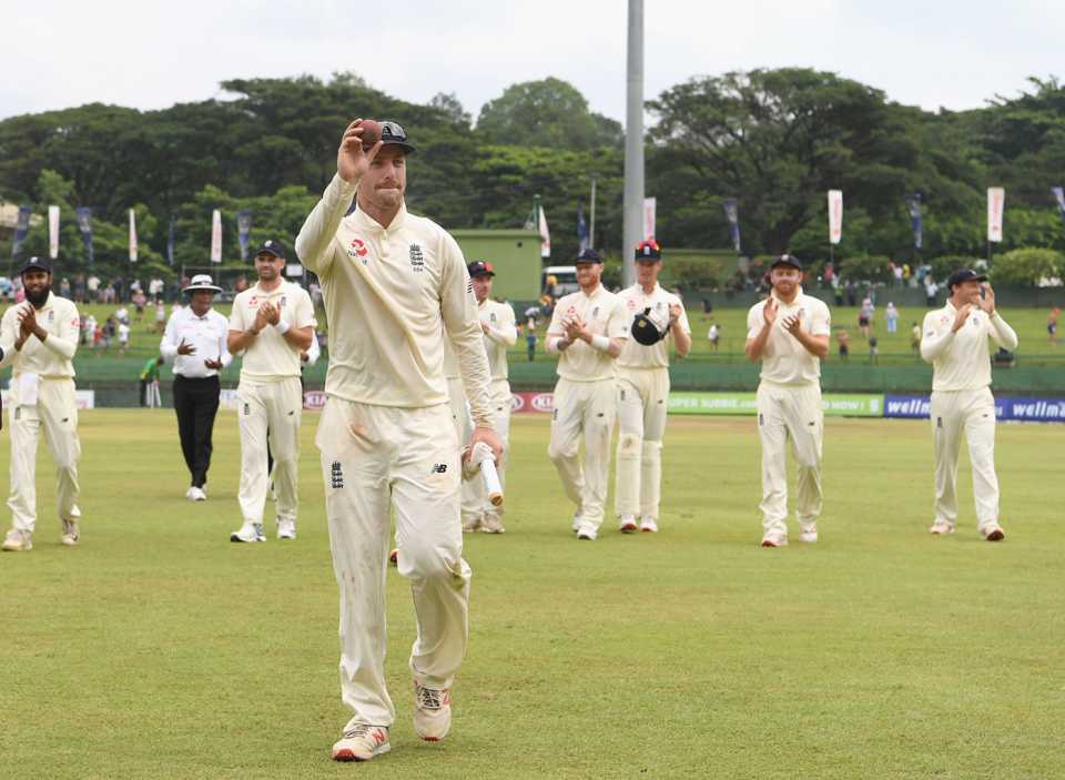 Jack Leach leads England from the field after his five-wicket haul at Pallekele