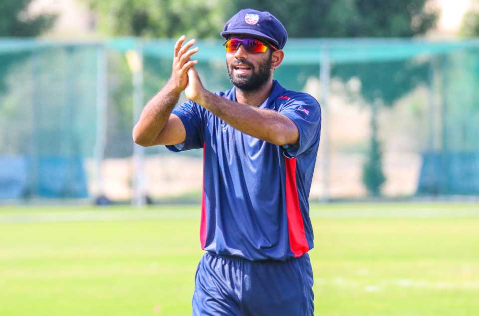 Captain Saurabh Netravalkar reciprocates applause from team-mates after his three-for, Singapore v USA, ICC World Cricket League Division Three, Al Amerat, November 19, 2018