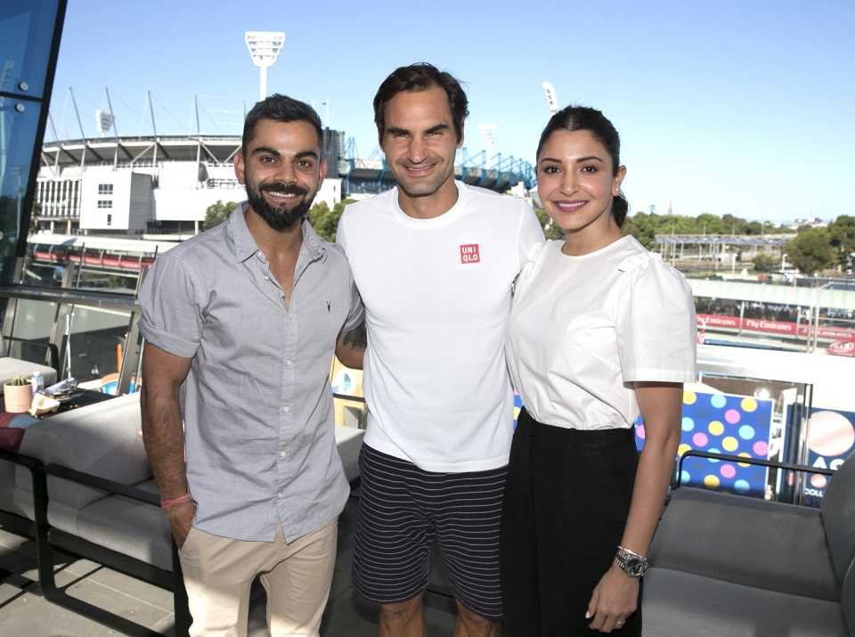 Virat Kohli and his wife Anushka Sharma strike a pose with Roger Federer at the Australian Open