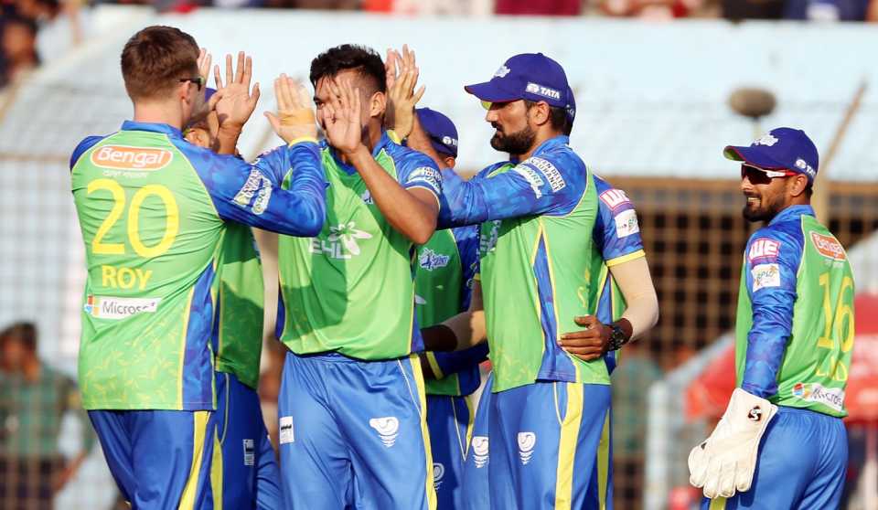 The Sylhet Sixers fielders celebrate a wicket