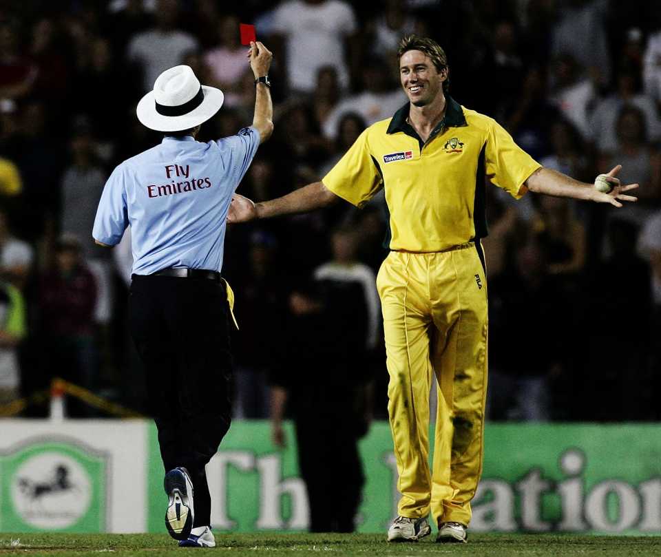 Billy Bowden shows Glenn McGrath a red card for bowling an underarm delivery to Kyle Mills
