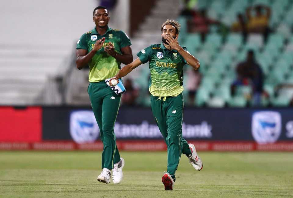 An ecstatic Imran Tahir sets off for a sprint after picking a wicket as Lungi Ngidi looks on