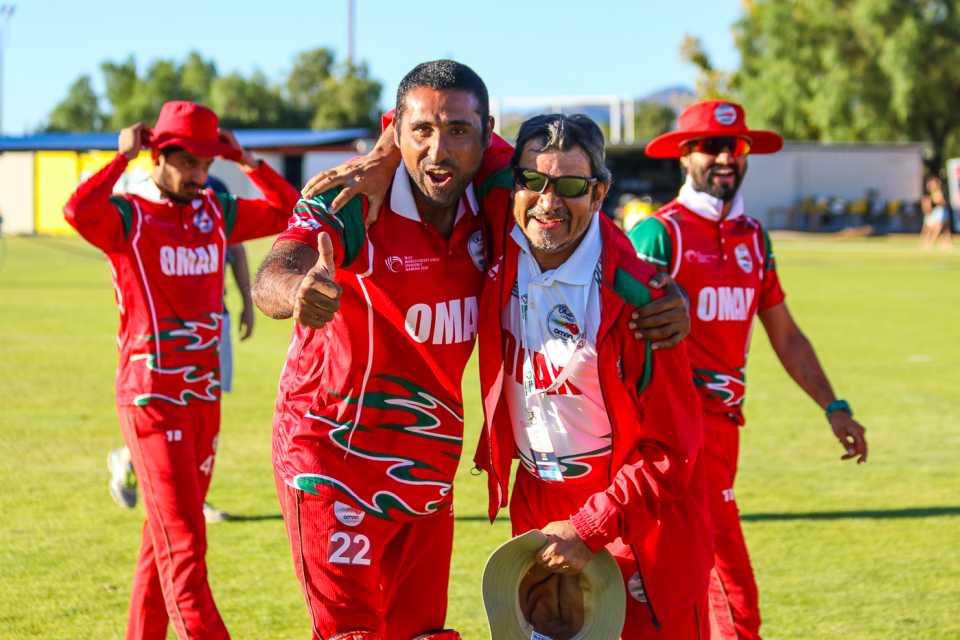 Fast bowler Kaleemullah and Oman Cricket director Pankaj Khimji celebrate Oman gaining ODI status