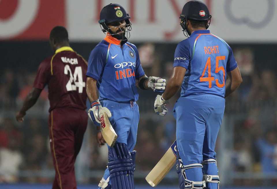 Virat Kohli and Rohit Sharma share some glove love, India v West Indies, 1st ODI, Guwahati, October 21, 2018