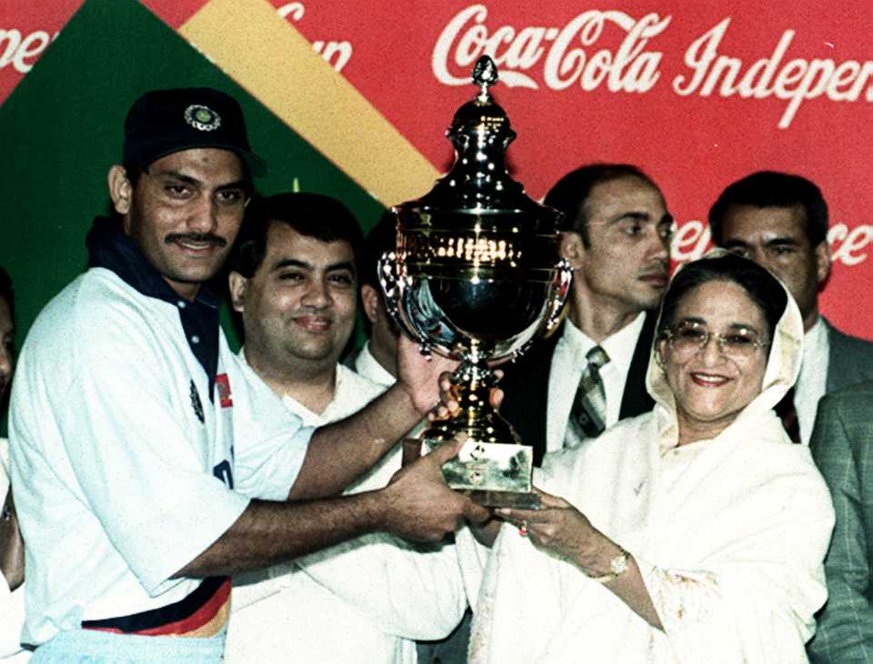 Bangladesh prime minister Sheikh Hasina hands India captain Mohammad Azharuddin the Independence Cup, India v Pakistan, Independence Cup final, Dhaka, January 18, 1998 