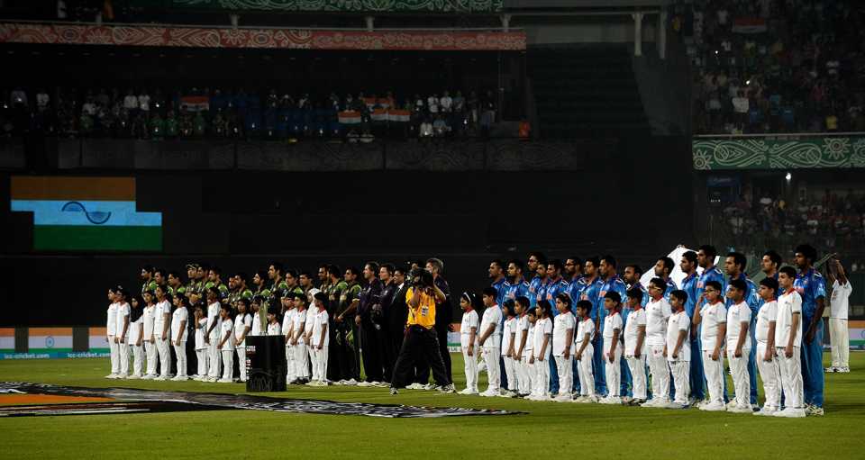 The players line up for the national anthems, India v Pakistan, World T20, Group 2, Mirpur, March 21, 2014 