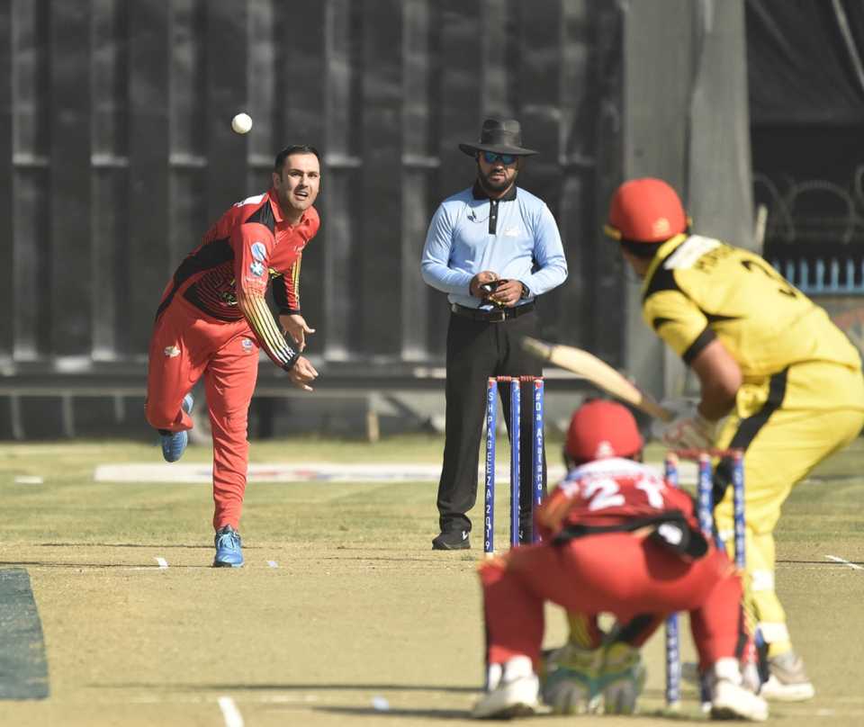 Mohammad Nabi bowls around the wicket