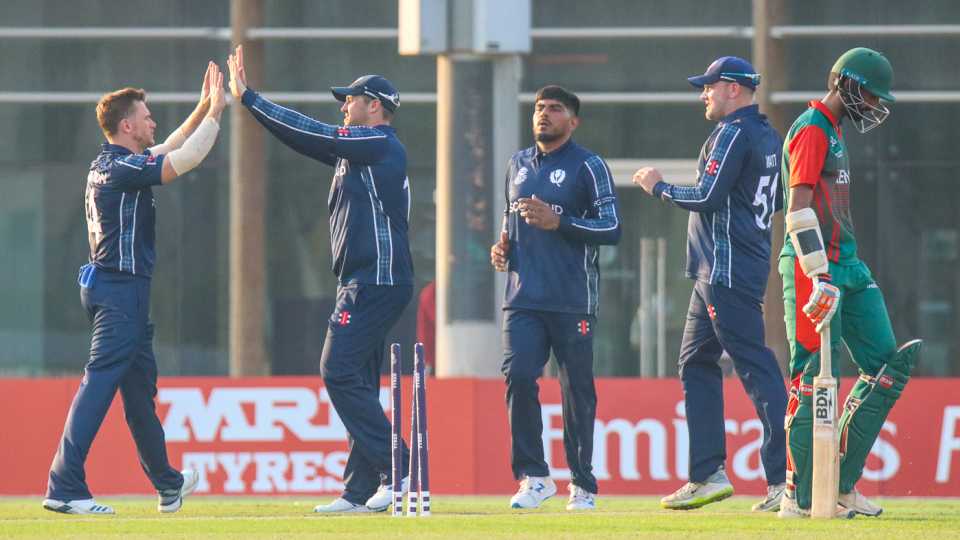 Richie Berrington gets a high five after bowling Irfan Karim for 51, Kenya v Scotland, T20 World Cup Qualifier, Dubai, October 19, 2019 