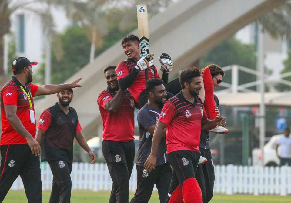 Navin Param is carried off the field after his unbeaten 72 off 41 balls took Singapore home, Bermuda v Singapore, ICC Men's T20 World Cup Qualifier, Dubai, October 20, 2019 