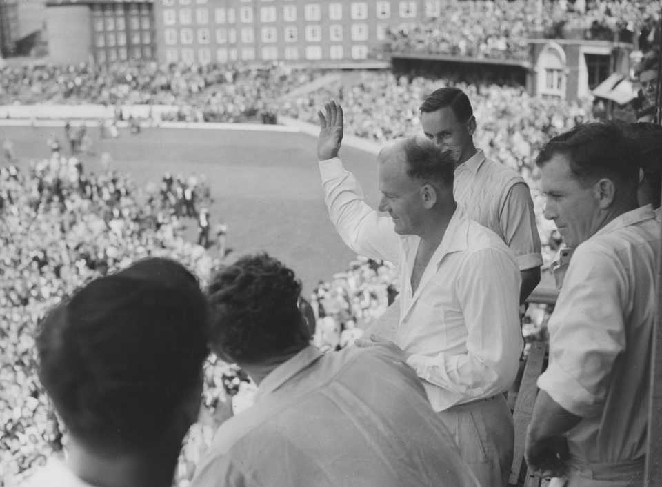 Tony Lock acknowledges the applause of the supporters from the balcony, fifth Test, England v West Indies, day three, The Oval, August 24, 1957