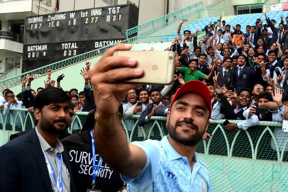 Rashid Khan takes a selfie with the fans