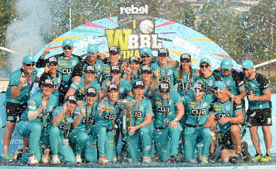 Brisbane Heat pose with the Women's Big Bash League trophy