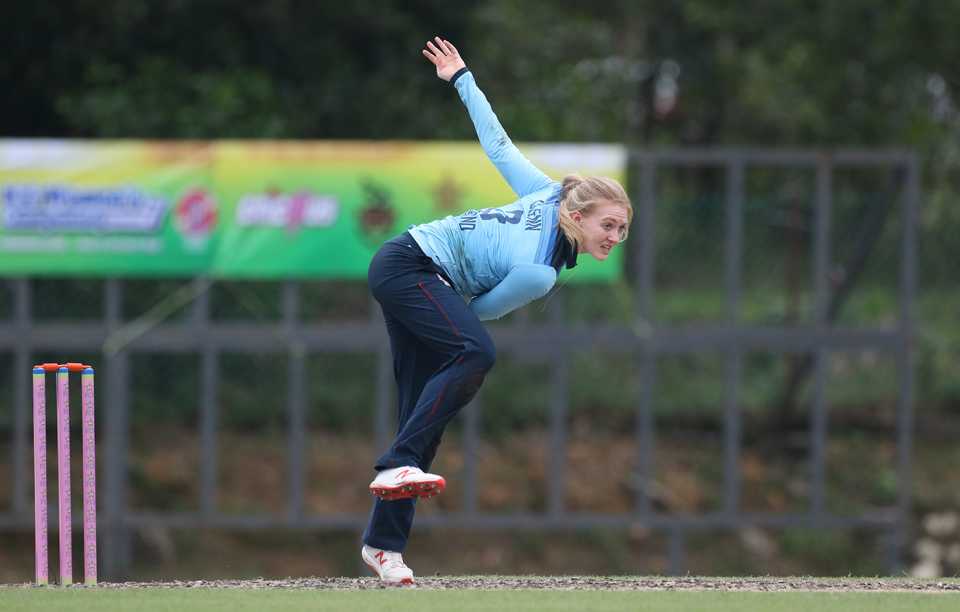 Sarah Glenn bowls on her England debut