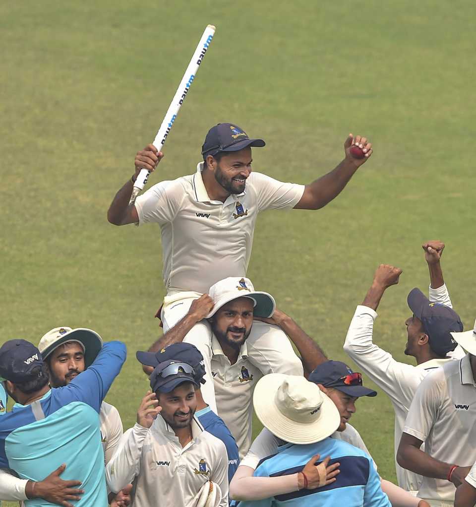 Mukesh Kumar is chaired off the field after starring in Bengal's win