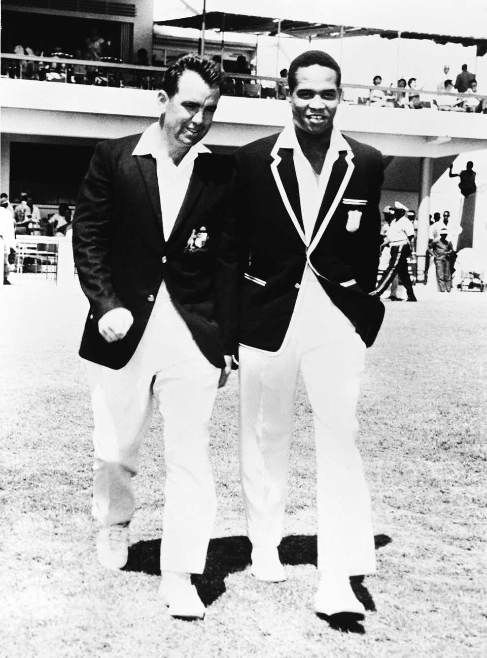 The two captains, Bob Simpson and Garry Sobers, walk out for the toss