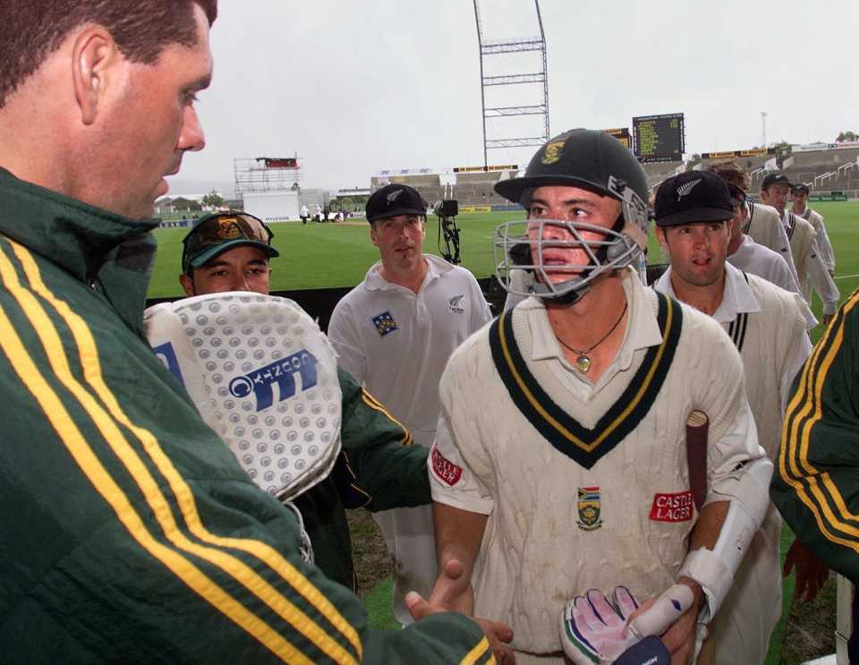 Herschelle Gibbs is congratulated by his captain Hansie Cronje after scoring his double century, second Test, South Africa v New Zealand, Christchurch, Mar 14, 1999