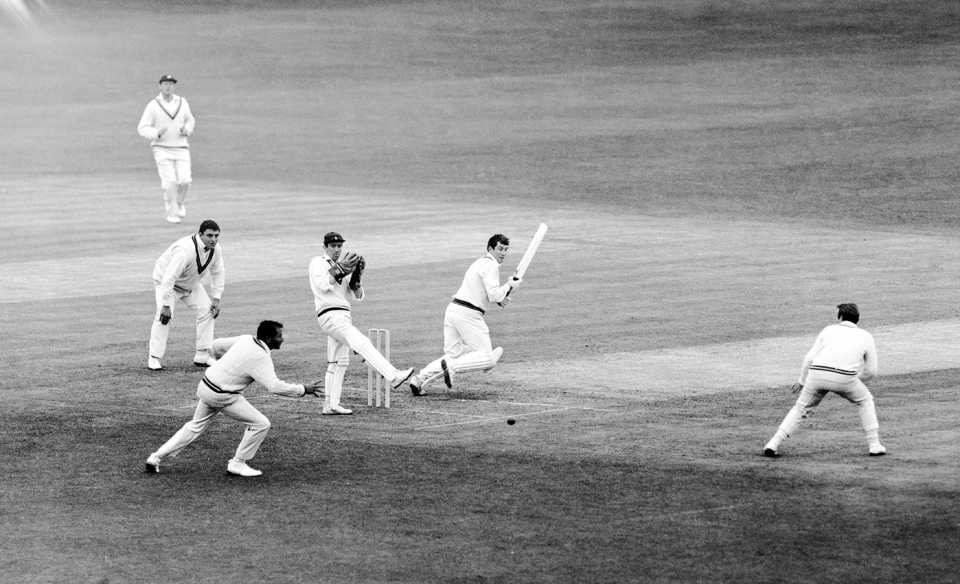 Basil D'Oliveria runs to intercept a ball played by Ian Chappell