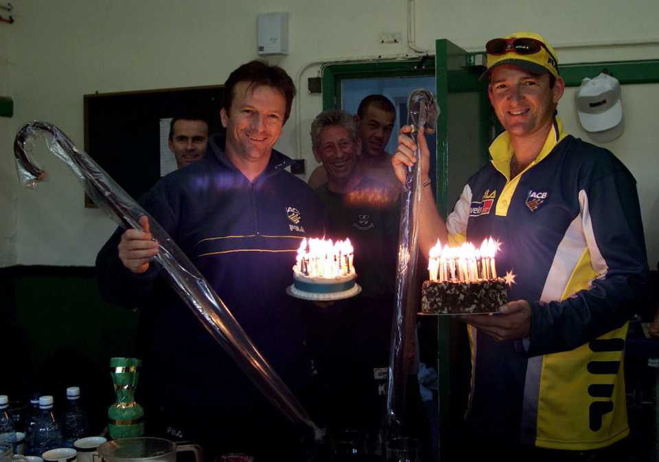 Steve and Mark Waugh with birthday cakes and walking sticks, day two, tour match, Worcestershire v Australians, New Road, Worcester, England, June 2, 2001