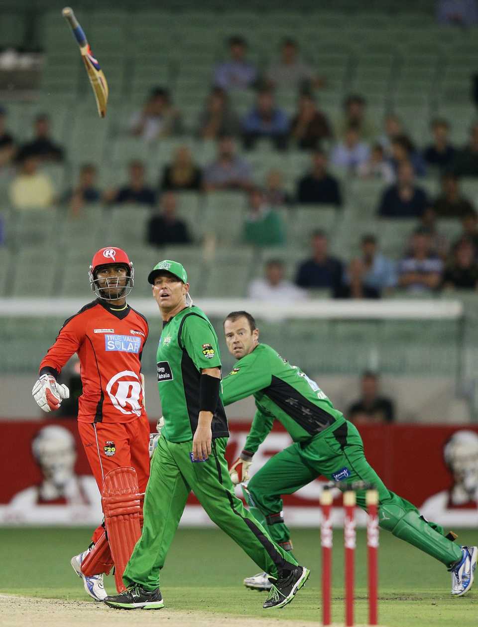 Marlon Samuels throws his bat in the air after getting hit by a throw from Shane Warne, Melbourne Stars v Melbourne Renegades, Big Bash League, MCG, January 6, 2013