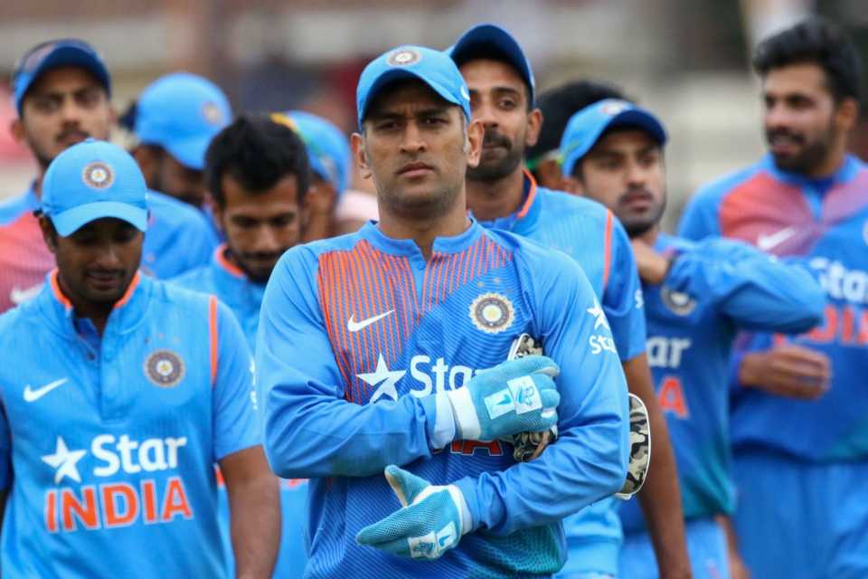 MS Dhoni leads the team off the field after India's victory