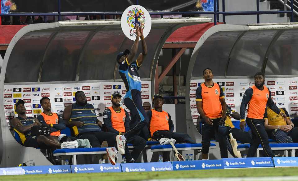 Justin Greaves takes a catch to dismiss Daren Sammy
