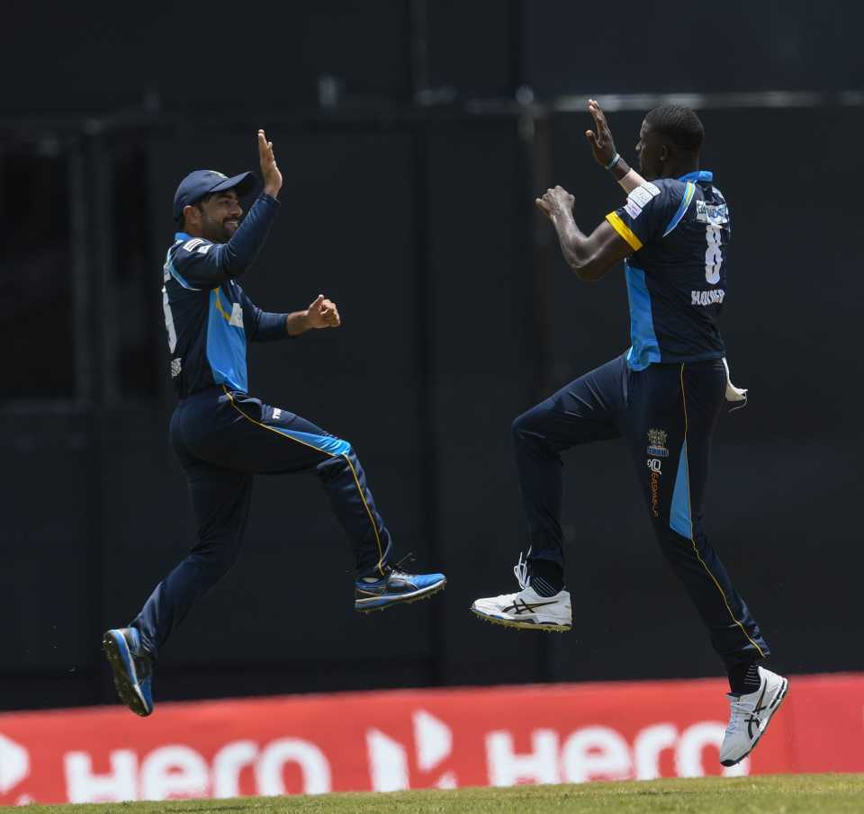 Rashid Khan and Jason Holder celebrate a wicket, St Kitts & Nevis Patriots v Barbados Tridents, CPL 2020, Port of Spain, August 25, 2020