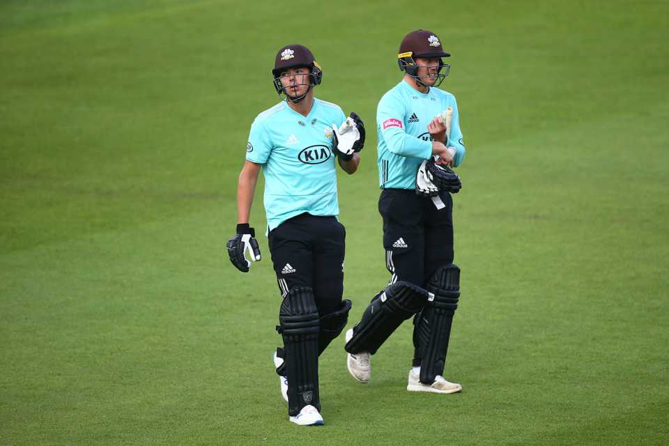 James Taylor and Matt Dunn trudge off after Surrey's tie