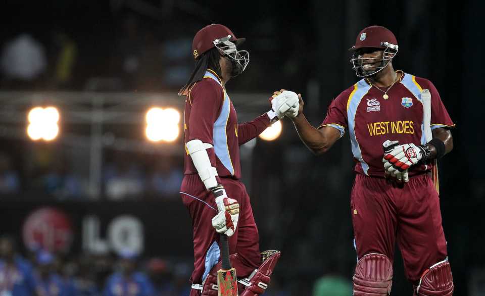Chris Gayle and Kieron Pollard at the end of the first innings
