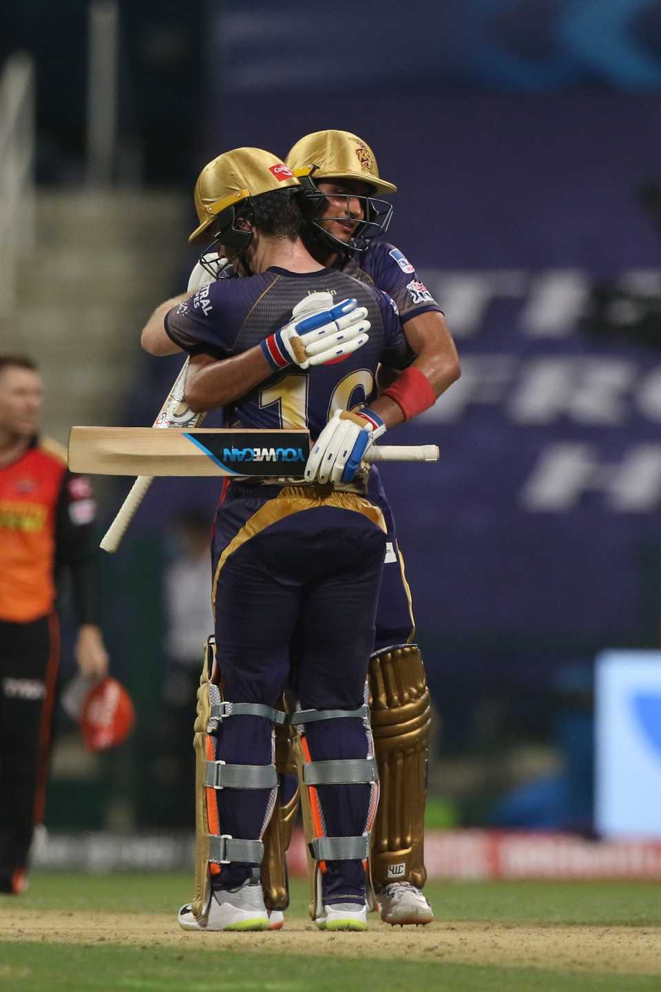 Shubman Gill and Eoin Morgan embrace after bringing up the winning runs