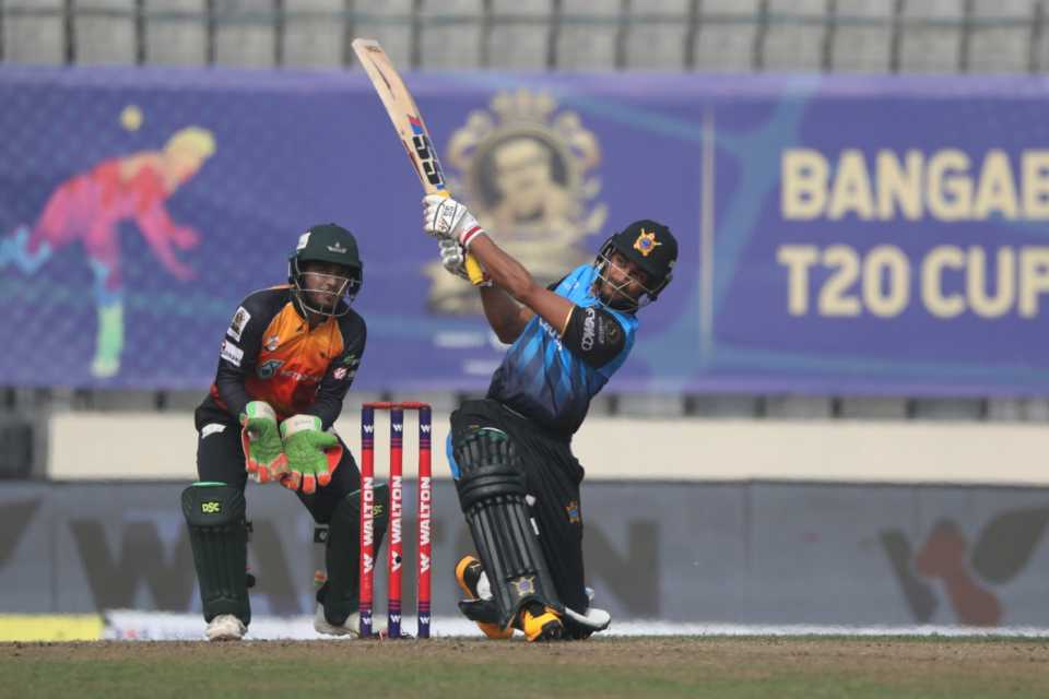 Mohammad Naim hits one of his four sixes off Shakib Al Hasan