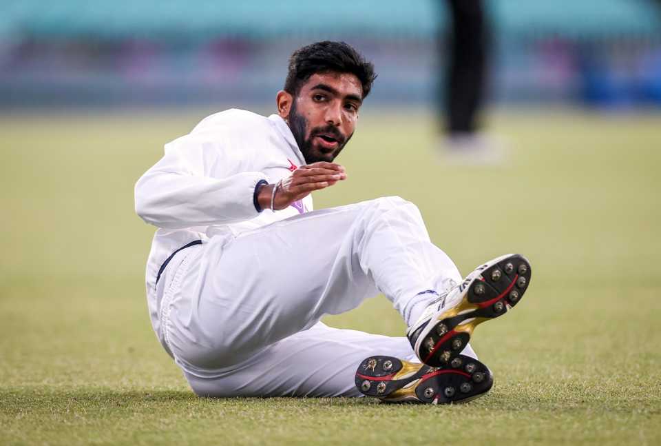 Jasprit Bumrah reacts after dropping a catch