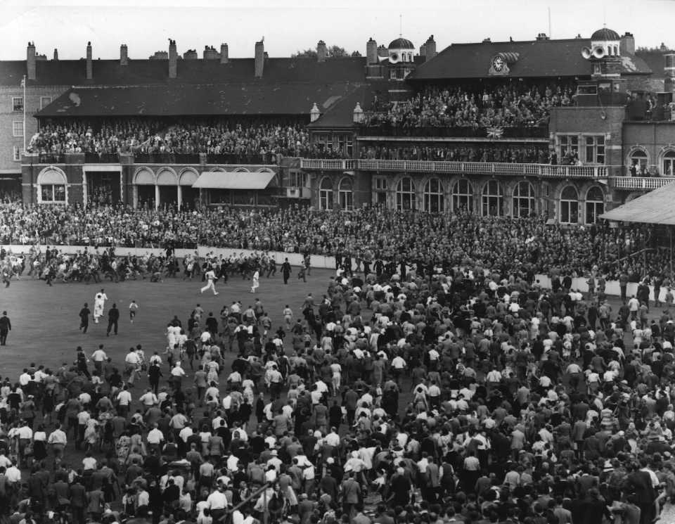 Crowds invade the pitch at the end of the final test against Australia