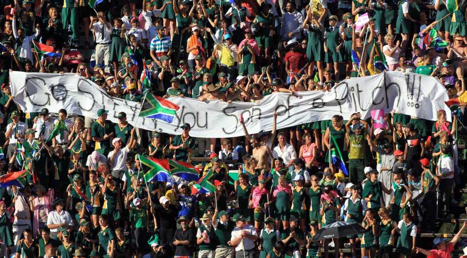 Fans hold up a banner with Dale Steyn's name