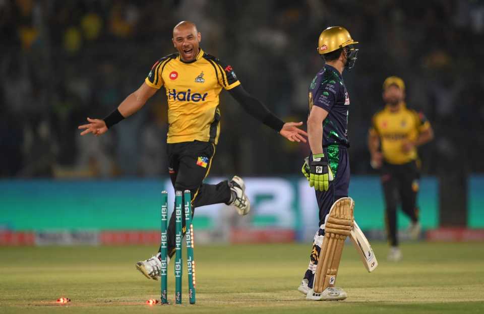 Tymal Mills celebrates the wicket of Ahmed Shahzad