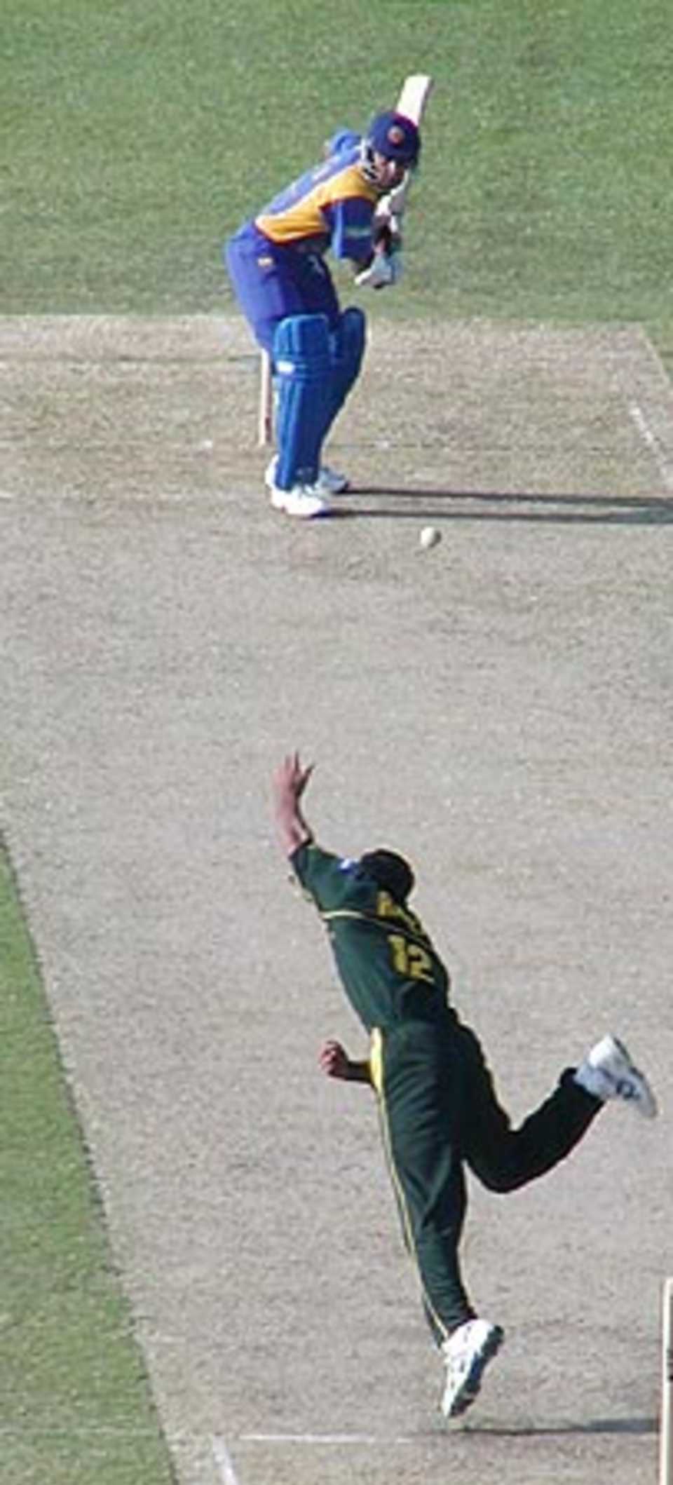 Razzaq bowling to Vaas, Morocco Cup, 2nd ODI at Tangier, Pakistan v Sri Lanka, 14 Aug 2002