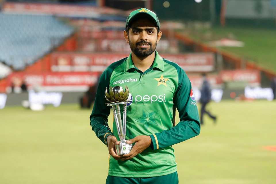 Babar Azam poses with the series trophy
