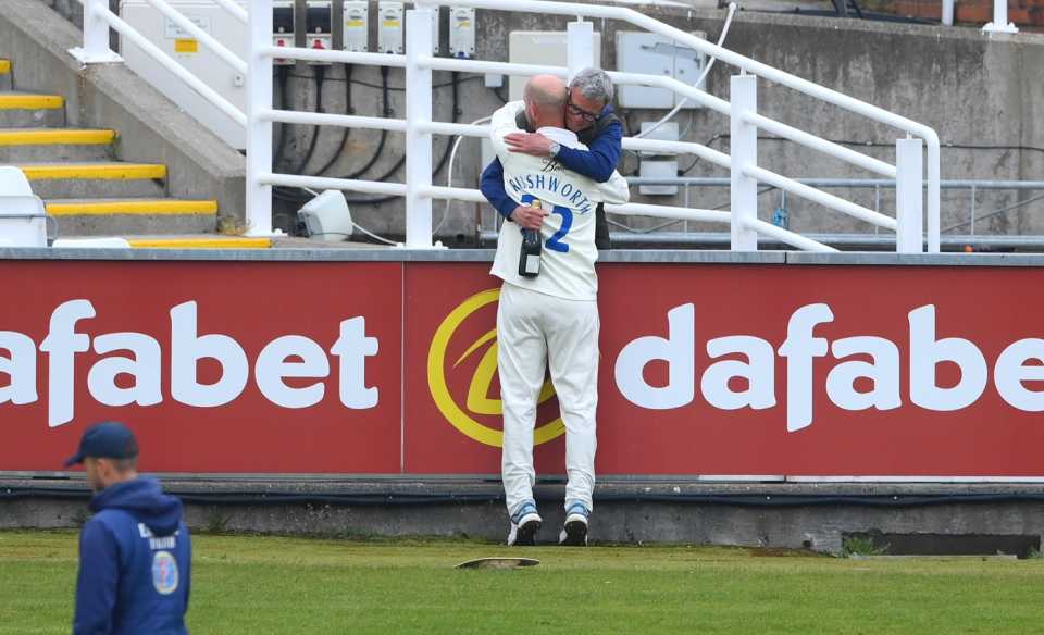 Chris Rushworth is congratulated by his father after passing Graham Onions to become Durham's leading first-class wicket-taker, Durham vs Worcestershire, LV= County Championship, Riverside, 4th day, May 16, 2021