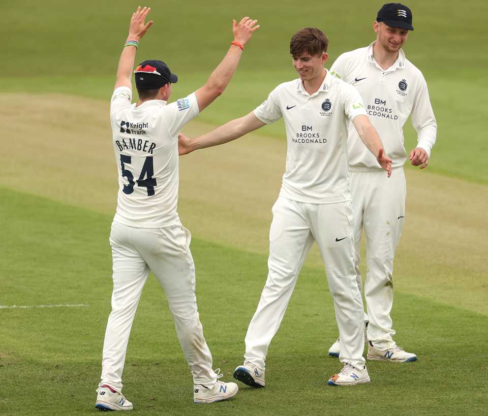 Martin Andersson celebrates with team-mate Ethan Bamber after taking the wicket of Ben Mike, LV= Insurance County Championship, Leicestershire vs Middlesex, day 2, Grace Road, May 28, 2021