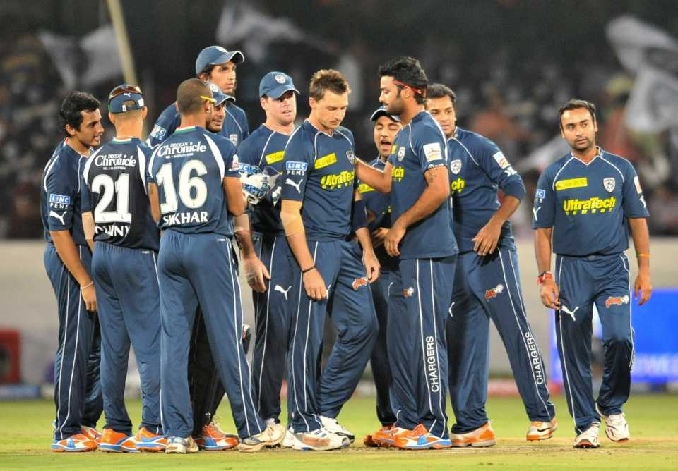 The Deccan Chargers players gather mid-pitch