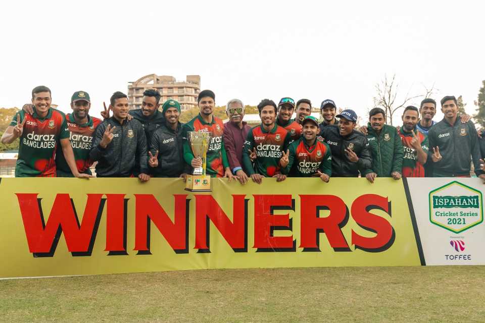 The victorious Bangladesh team pose with the trophy after blanking Zimbabwe 3-0 in the ODIs