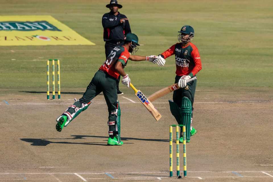 Mohammad Naim and Soumya Sarkar tap gloves during a century opening stand, Zimbabwe vs Bangladesh, 1st T20I, Harare, July 22, 2021
