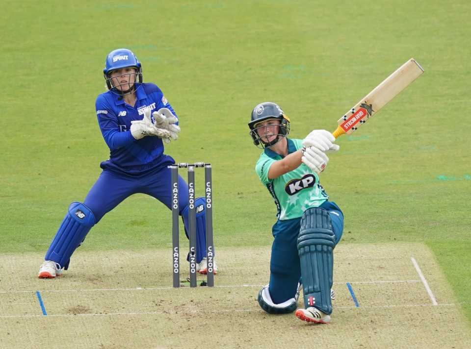 Alice Capsey drives over the covers during her remarkable innings at Lord's
