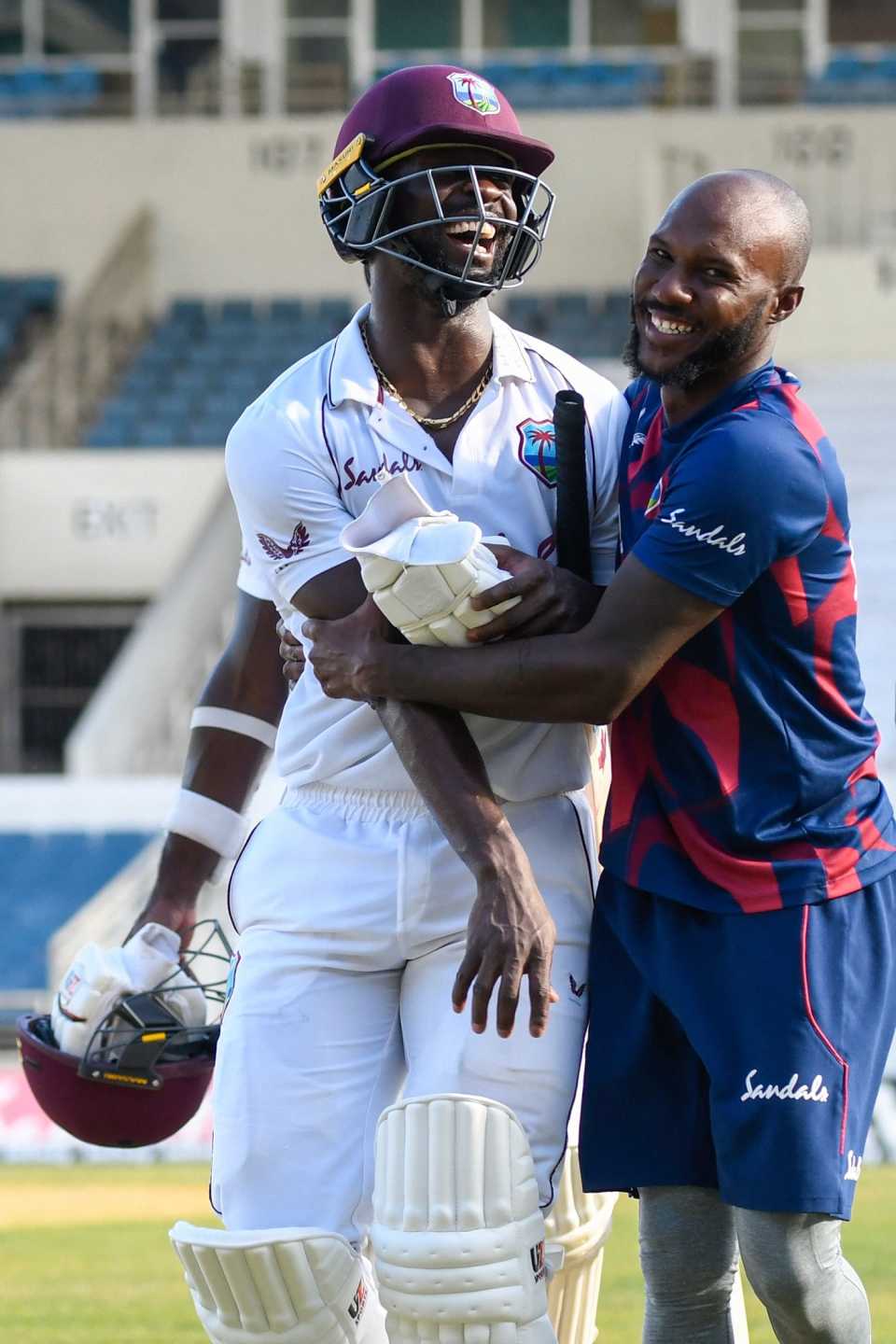 Kemar Roach and Jermaine Blackwood, heroes of West Indies' triumph, enjoy the winning moment